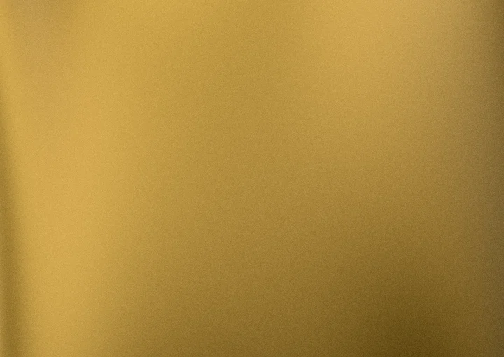 Gold grainy gradient background 9 with hex #b08424, #f0c23a