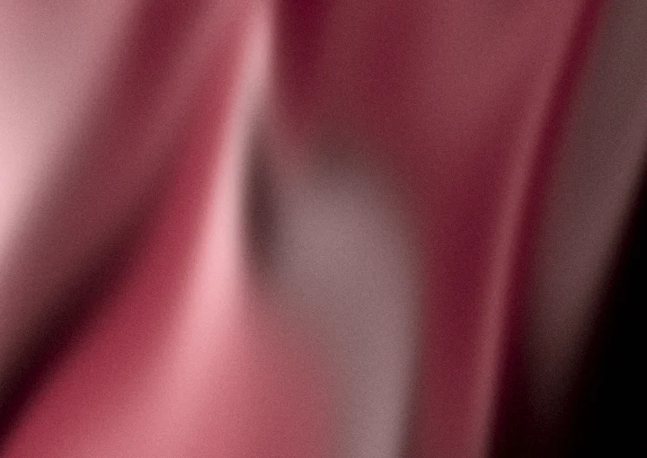 Maroon grainy gradient background 4 with hex #68122a, #9e3448