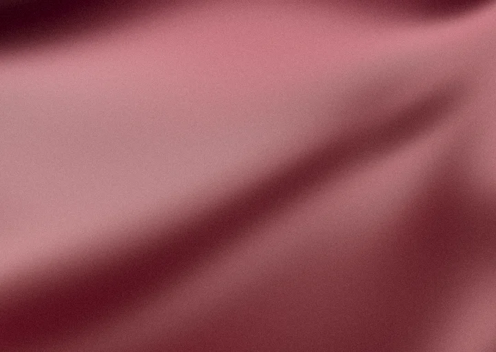 Maroon grainy gradient background 7 with hex #701426, #a63a50