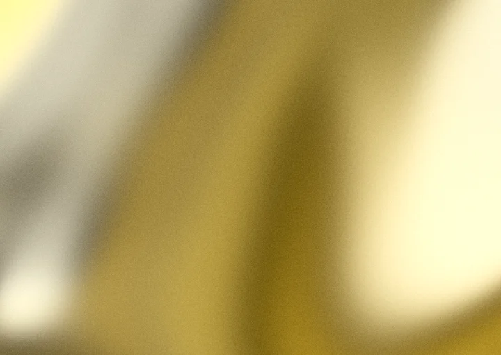 Yellow grainy gradient background 1 with hex #e0b40f, #ffd94d